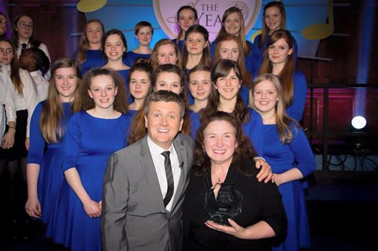 Hereford's Cantabile Girls Choir accepting the trophy from Aled Jones